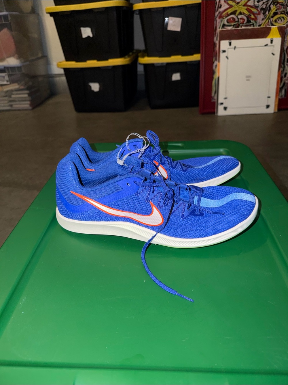 Blue nike track spikes